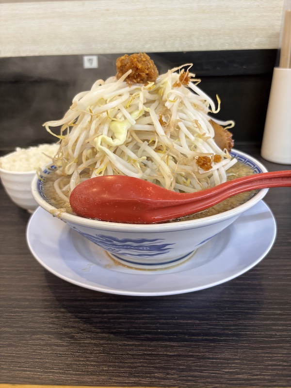 極めん
